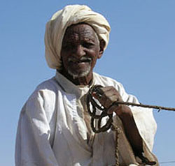 Camel driver in Mygoma, a suburb of Khartoum