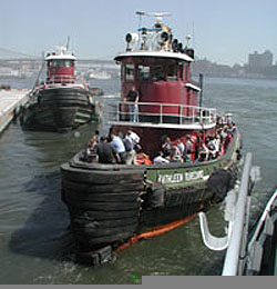 Tugboat rescuing people escaping collapse of Twin Towers on Sept. 11, 2001