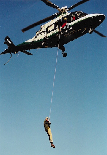 Pix of pilot is lowered onto a car carrier